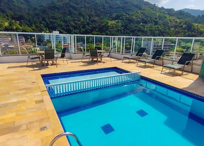 Apartamentos a 200m praia das Toninhas - Condomínio Vista Verde | Piscina na Cobertura com vista Espetacular Ubatuba